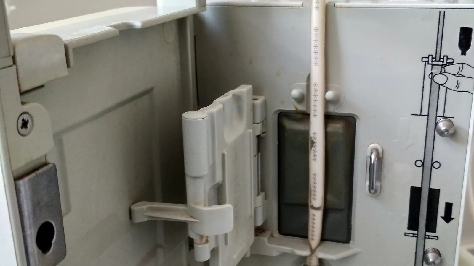 Dosing pump unit loaded with clear multi-channel tubing on a lab cart