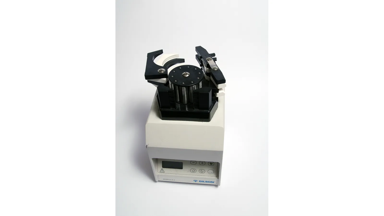 Laboratory peristaltic pump head with open roller assembly, full view on white background