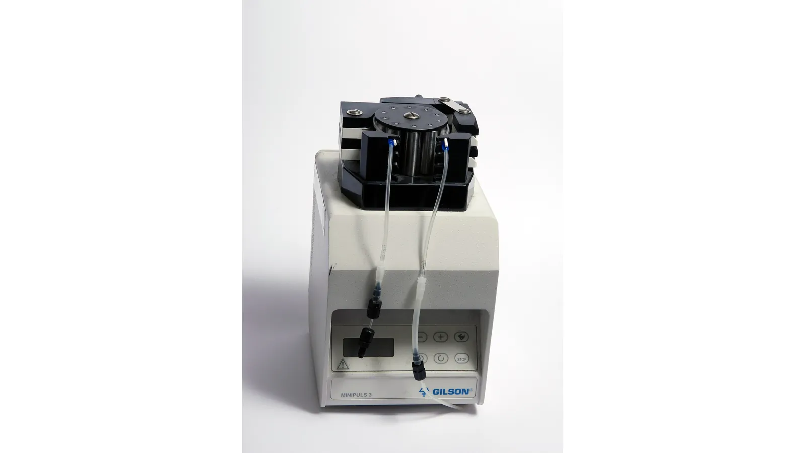 Laboratory peristaltic pump with digital display and roller head, full view on white background